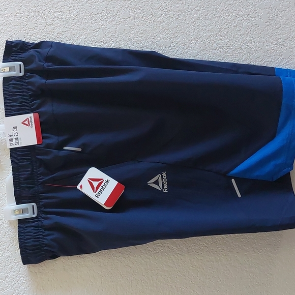 Reebok Shorts Reebok Mens Active Unstoppable Woven Shorts Standard